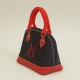 Naïa Sac à main artisanal français en tissu à voile de bateau et cuir pleine fleur